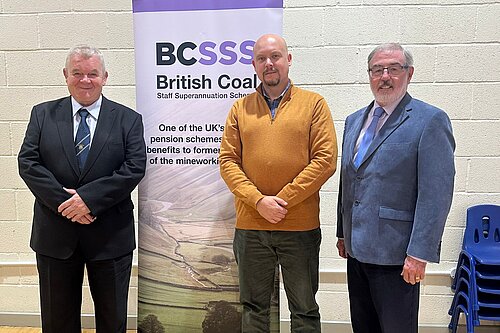 Cameron Thomas stands with members of the British Coal Staff Superannuation Scheme